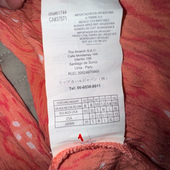 Rip Curl Orange Smocked 3/4 drape Sleeve romper size S. Worn once. EUC - Picture 13 of 13